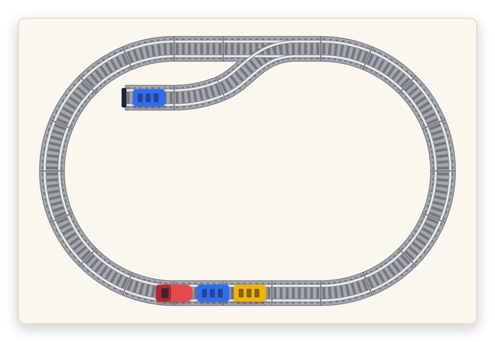 An oval track with a siding laid out on a 120 by 80 cm table, seen from above, with a train on it